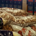 a shelf of beans and canned good at the Fullerton College food bank
