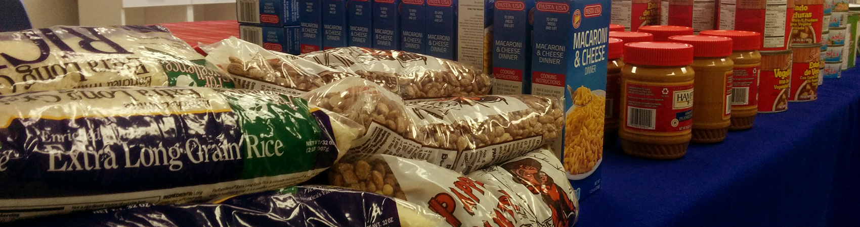 a shelf of beans and canned good at the Fullerton College food bank